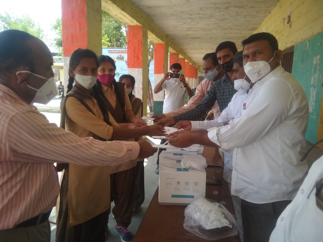 Senior citizen receiving mask